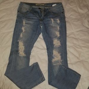 "Machine" distressed/ripped denim jeans
